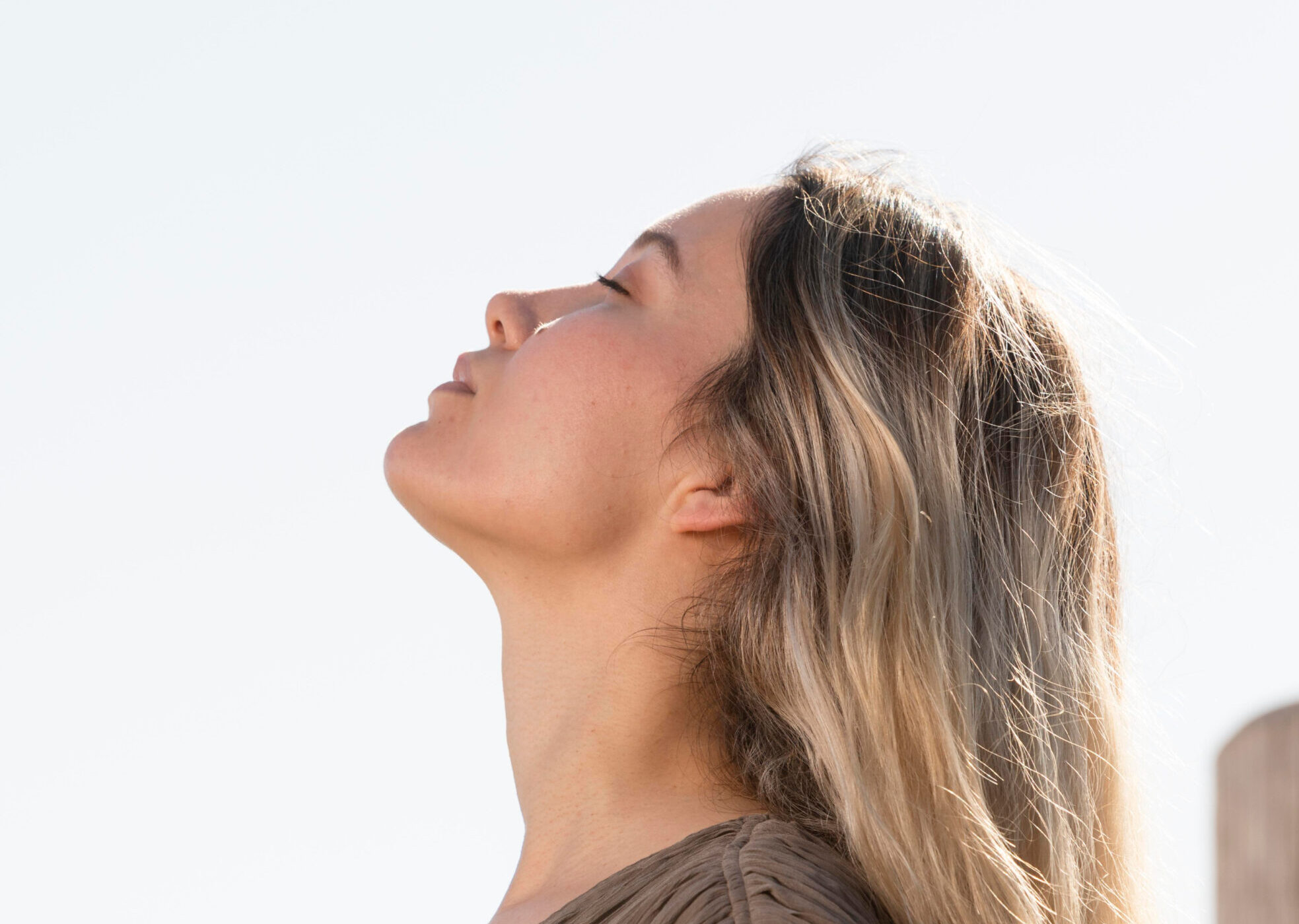 Woman feeling relief and calm after completing ketamine therapy in Queens NY